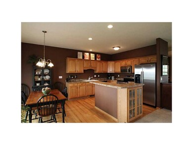 . Eat-in kitchen with sliders to deck.  Stainless 