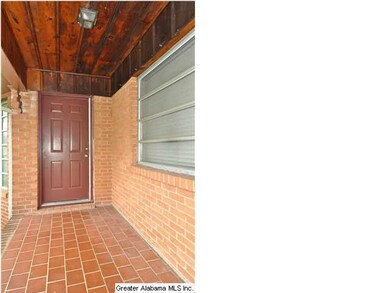 Relax on your covered side porch!