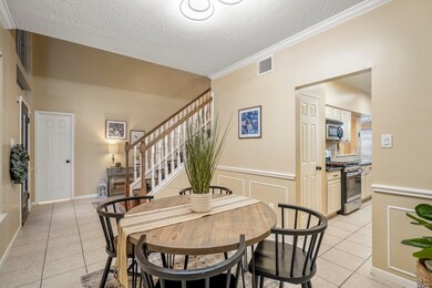 The dining room sits just off the front foyer and