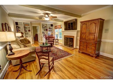 The family room features a wood burning fireplace 