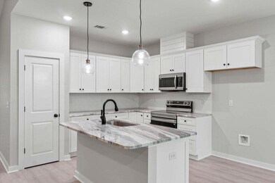 Kitchen with Granite Island