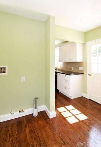 Laundry room off kitchen.  Room for side by side u