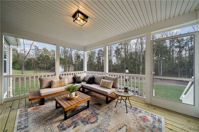 Sunroom featuring healthy amount of natural light,