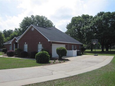 that is extended beyond the garage for addit pking