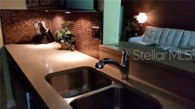 Nice tile backsplash and new faucet.