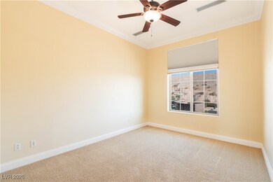 Unfurnished room featuring visible vents, carpet f