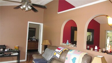 Formal Living Room with Archways open to Formal Dining Room