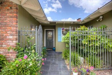 Gated entry courtyard with slate walk