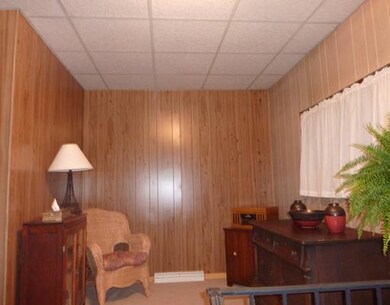 Den. Sitting area off first floor bedroom/bath is 