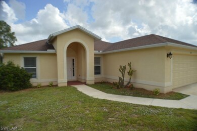 122 Ridgemont Dr, Lehigh Acres, FL 33972 - photo 2