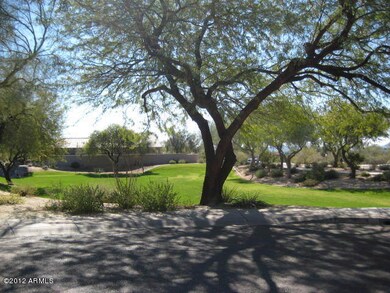 Across from grassy play area