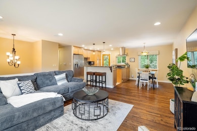 Wood floors throughout living room and  main floor