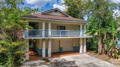 Coastal inspired home with a shingled roof, an att