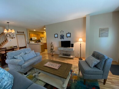 Very open living/dining room design with gorgeous wood floors