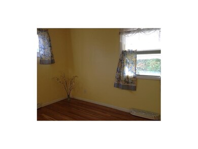 Master bedroom offers hardwood floors and well-pla