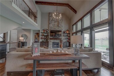 Designer Lights & Wood Architecture throughout!