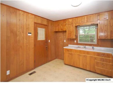Door at left leads to 2-car garage. Room for eat-in breakfast area for casual dining.