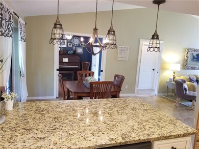 The view from the kitchen flows through the dining
