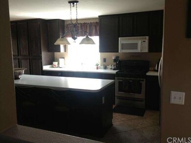HOME IS APPOINTED WITH LOVELY CUSTOM LIGHTING THRO