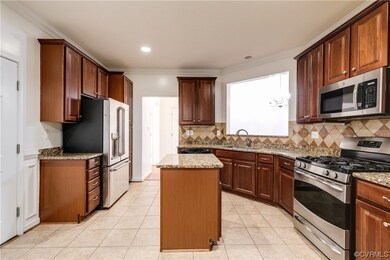 Kitchen featuring stainless steel appliances, a ki