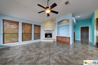 Upper level den, kitchen is to the right. Open spa