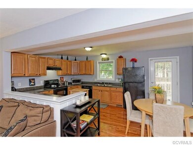 The elevated bar counter top in the kitchen allows