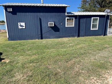 Street side view of lakeside cabin #8