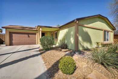 Single story home featuring an attached garage, co