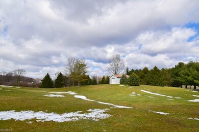 On 5.75 acres with a pole building and 4-car detac