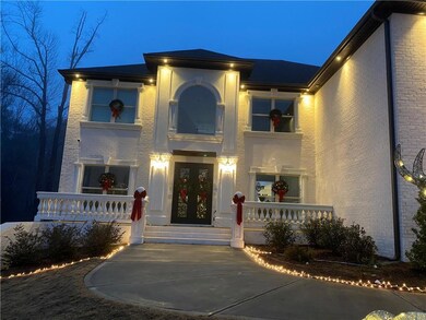 View of front of house featuring brick siding