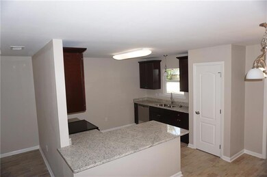 Kitchen - Granite Counters/Wood Cabinets and SS ap