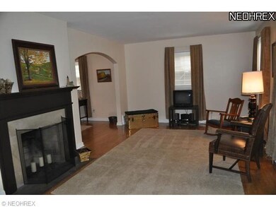 Charming with hardwood flooring, cozy fireplace & 