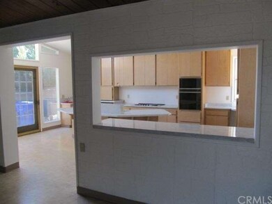 VIEW INTO KITCHEN FROM DINING AREA
