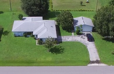 Front view aerial view of the home