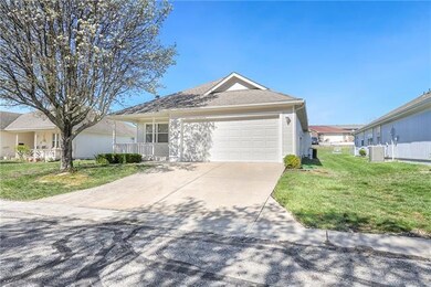 514 S Saturn Dr, Raymore, MO 64083 - photo 2