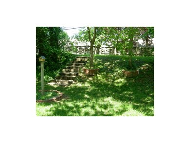 STEPS TO TOP OF SMALL HILL IN BACK