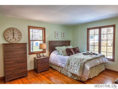Bedroom with Backyard Views