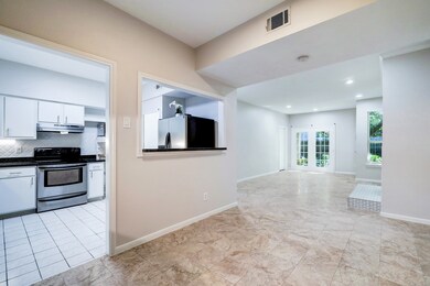 Breakfast/dining area overlooking living area.