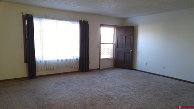 Looking toward front door. Lots of light here.