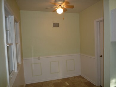 Wainscotting in the kitchen dining area with acces