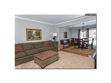 FAMILY ROOM FLOWS INTO INFORMAL DINING/GAME AREA