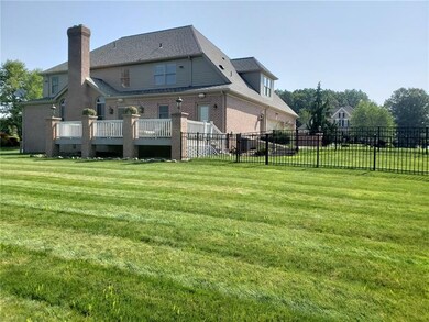 Large, flat backyard with fenced dog area off of d