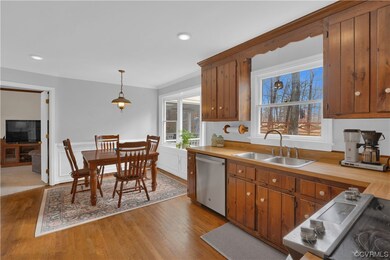 Kitchen featuring sink, hardwood / wood-style floo