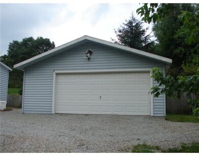Parking Lot/Garage. Oversized garage for cars and 