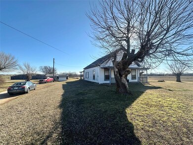 View of home's exterior with a lawn