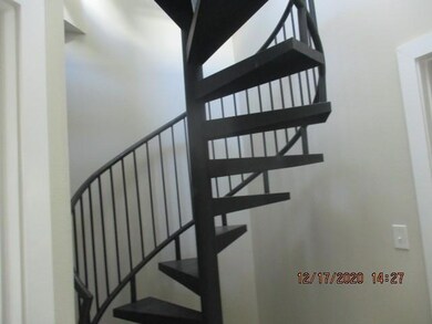 Spiral staircase to the roof top