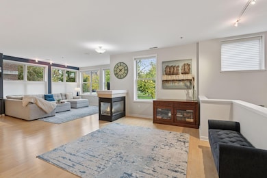 3-sided fireplace to enjoy and take in beautiful park views!