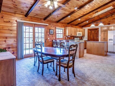 Dining Room leads to Deck and Kitchen