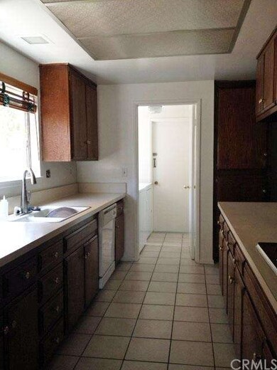 Another view of the kitchen from the dining area. 