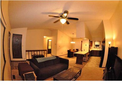 View of the Living Room, Kitchen, and Dining Room.